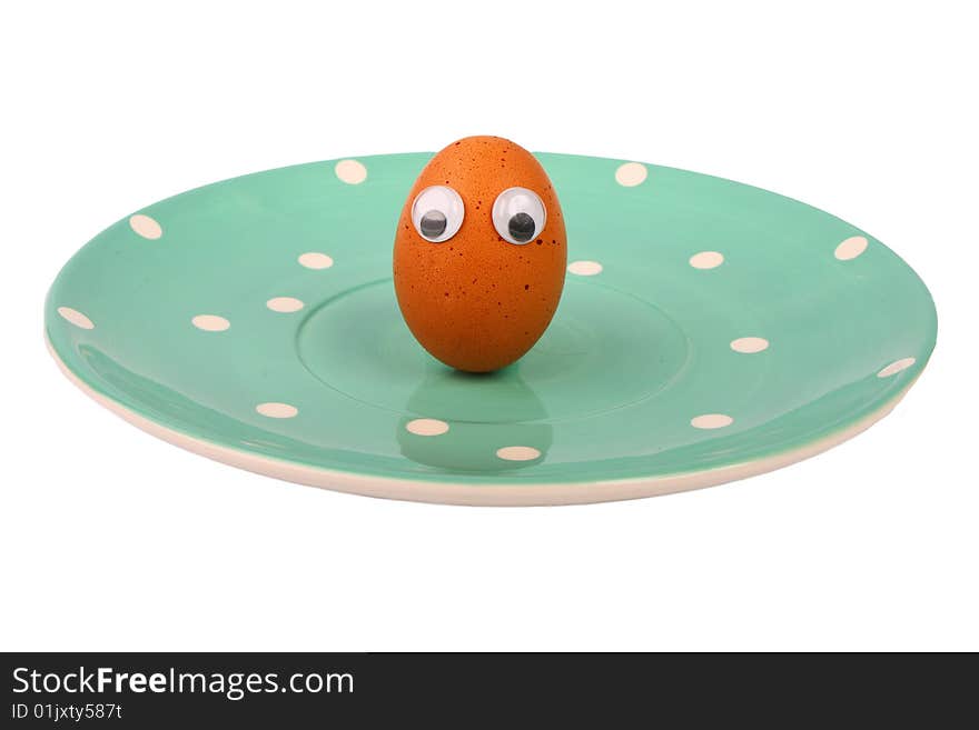 Brown egg on grean plate. Brown egg on grean plate.