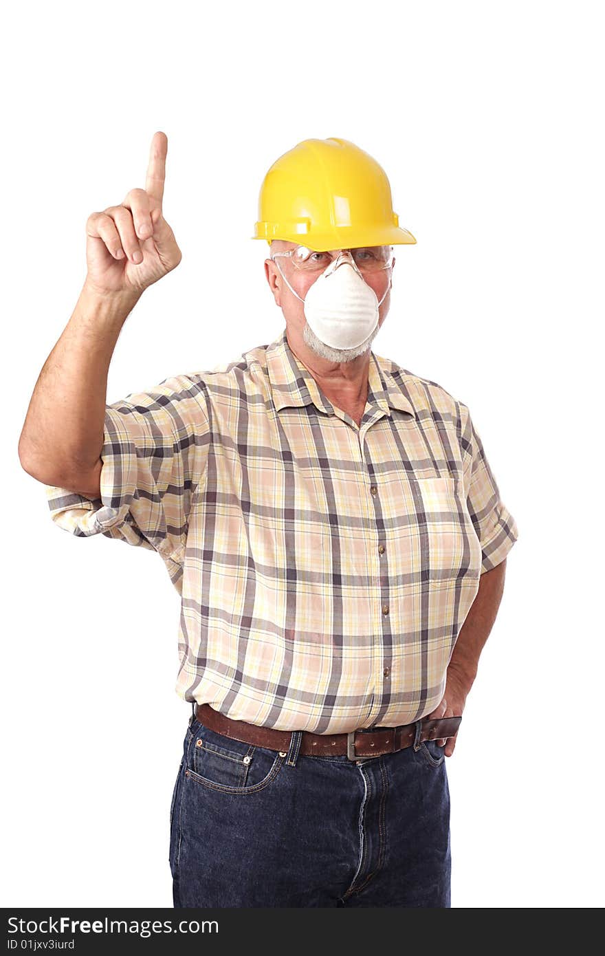 Senior construction worker in a dust mask pointing up. Senior construction worker in a dust mask pointing up