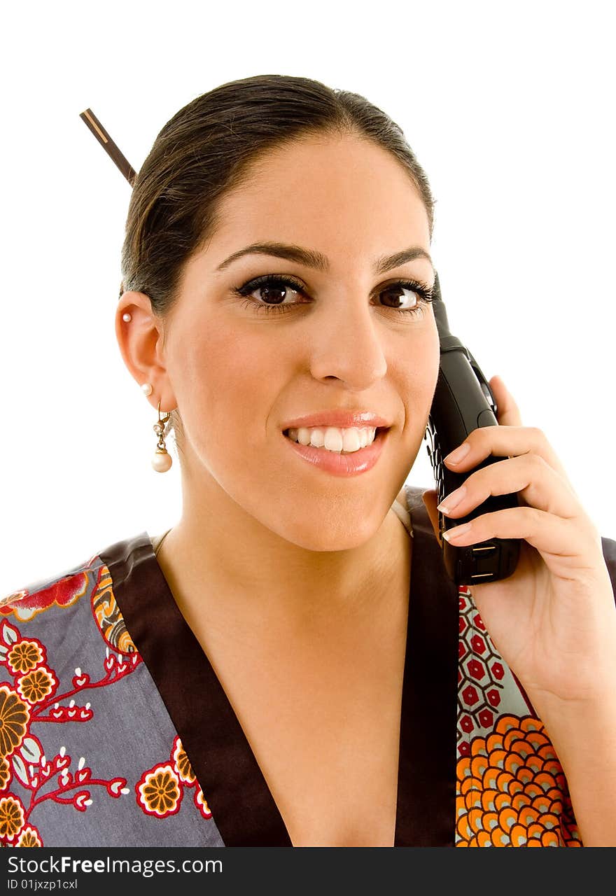 Pretty Young Woman In Kimono Busy Talking On Phone