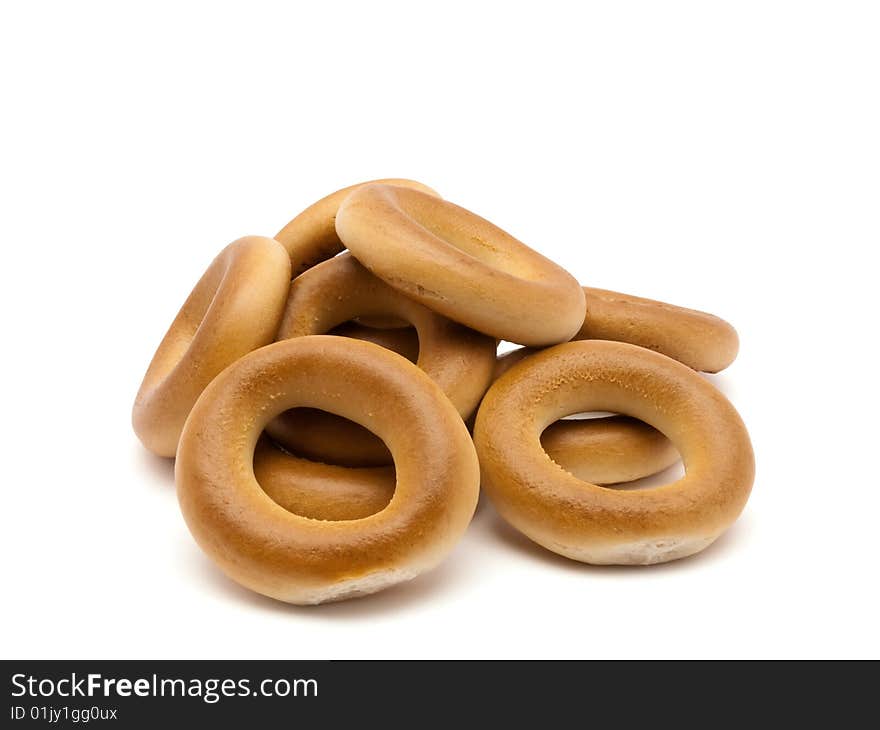 Much bagels isolated on white background with  path. Much bagels isolated on white background with  path