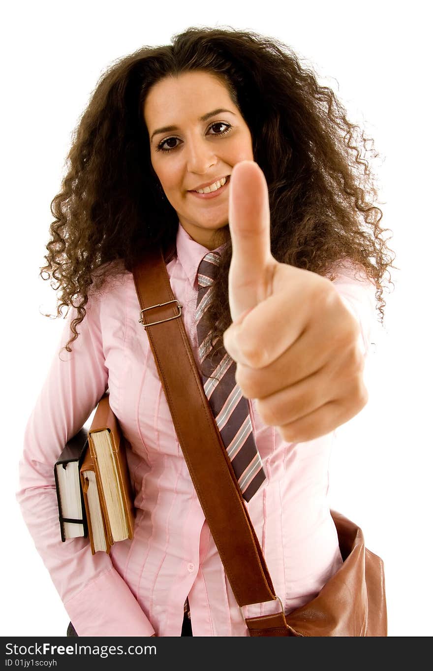 Young female student with thumbs up on an isolated background