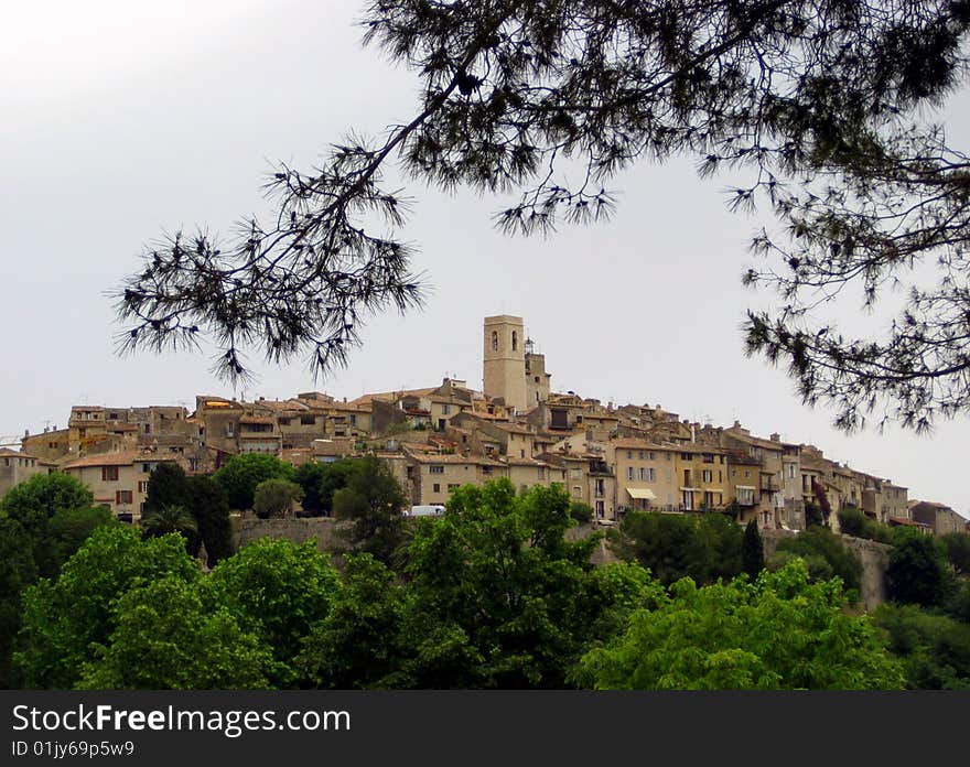 The view of a medieval hill village in France. The view of a medieval hill village in France