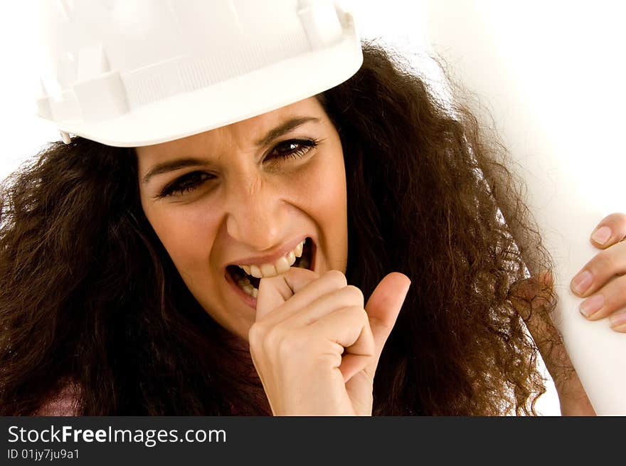 Young frustrated female architect with white background