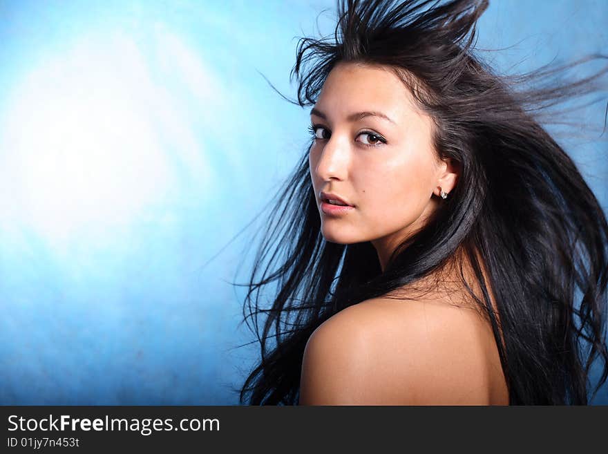 Beautiful model in studio turning around. Beautiful model in studio turning around