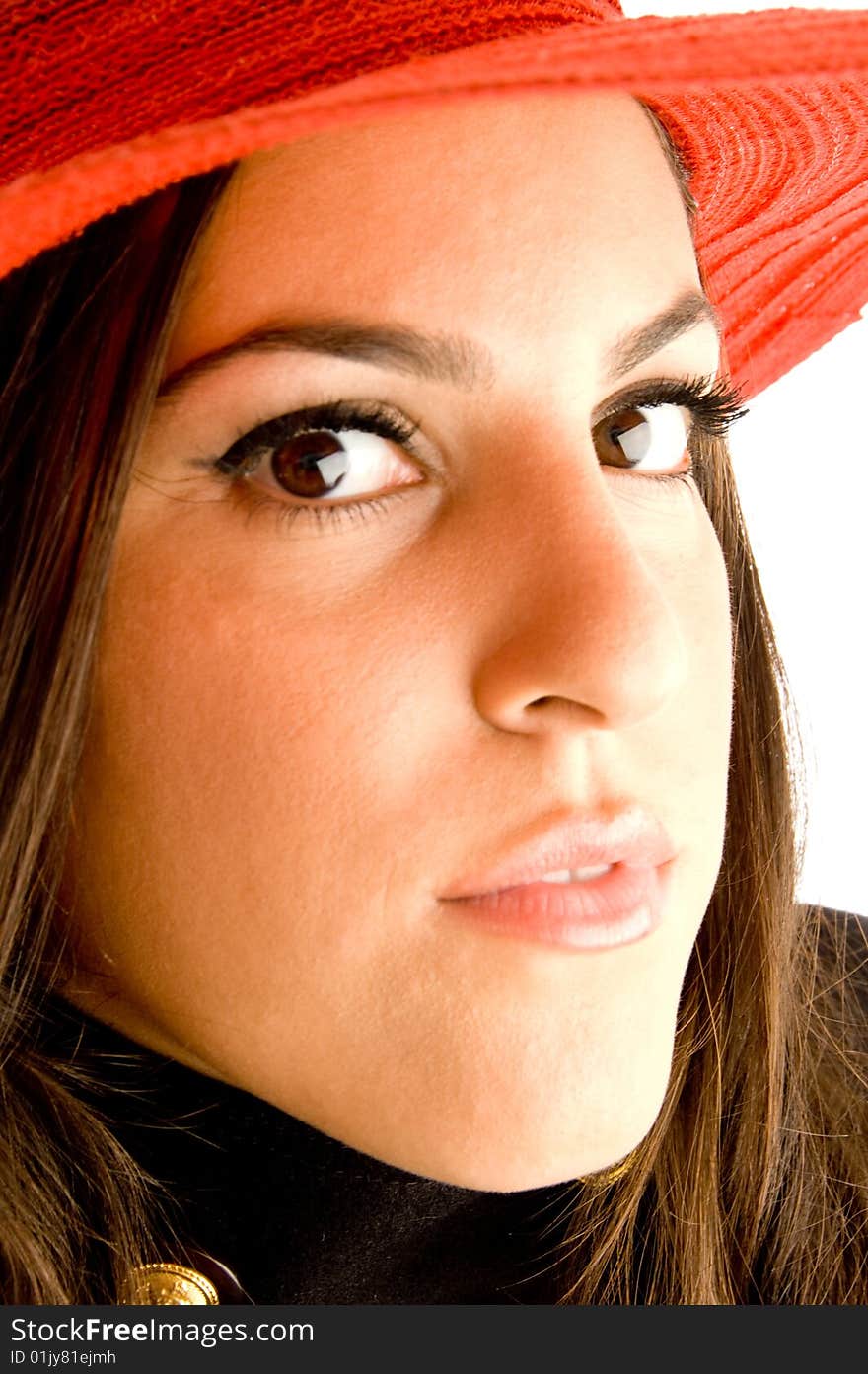 Young model posing with red hat