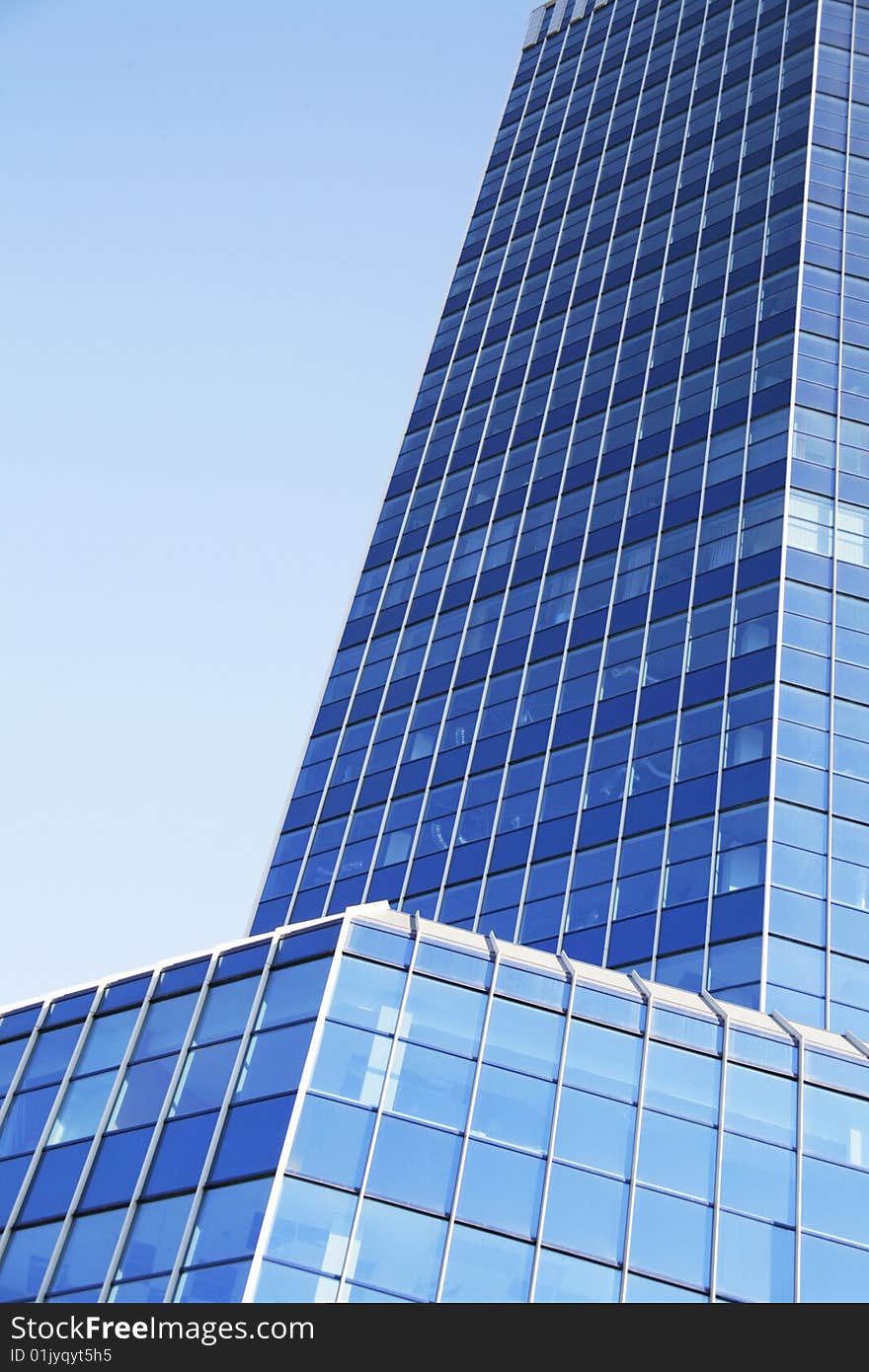 Skyscraper on a background of the blue sky