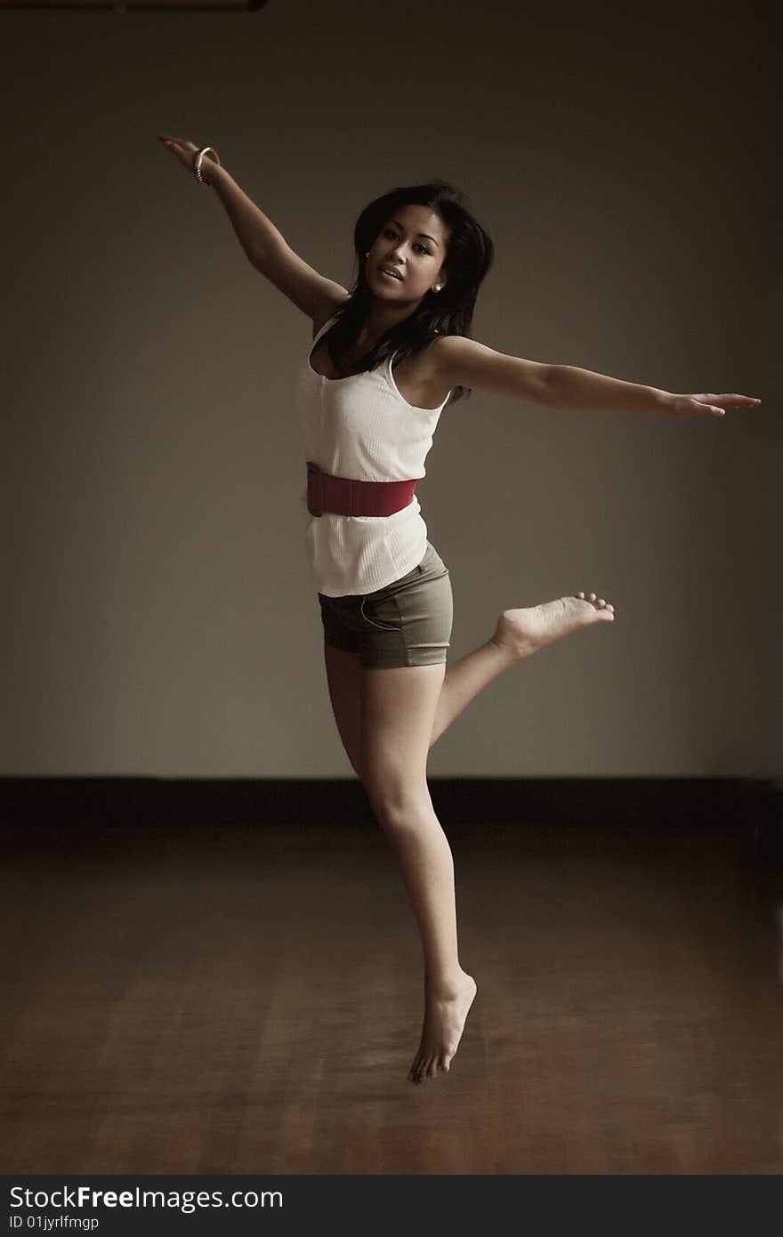 Portrait of an Indonesian girl jumping