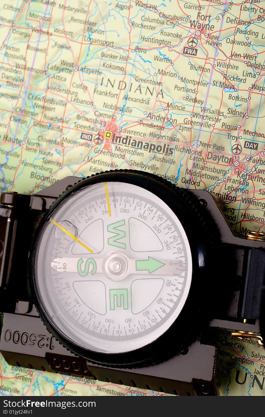 Steel compass on travel map of Indianapolis. Steel compass on travel map of Indianapolis