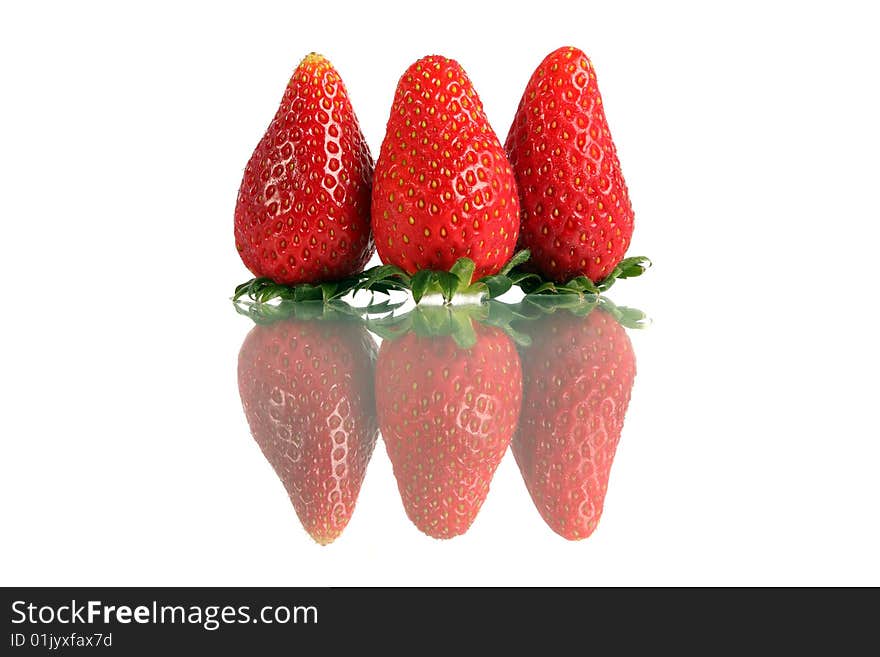 Close up of Korea strawberry standing over white background.