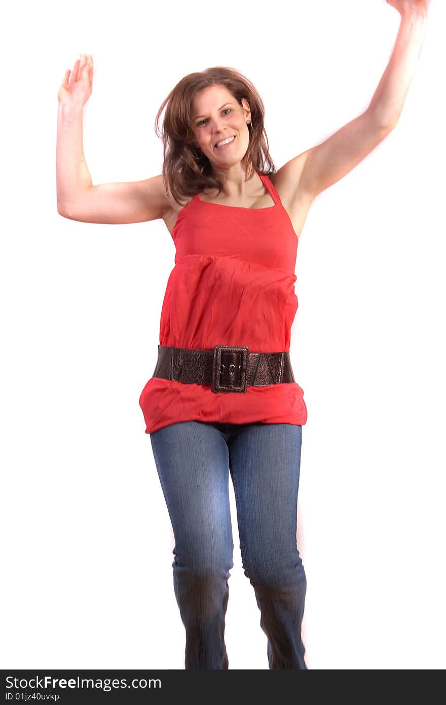 A young woman is jumping happy. Slight motion bluriness is intended! Isolated over white. A young woman is jumping happy. Slight motion bluriness is intended! Isolated over white.