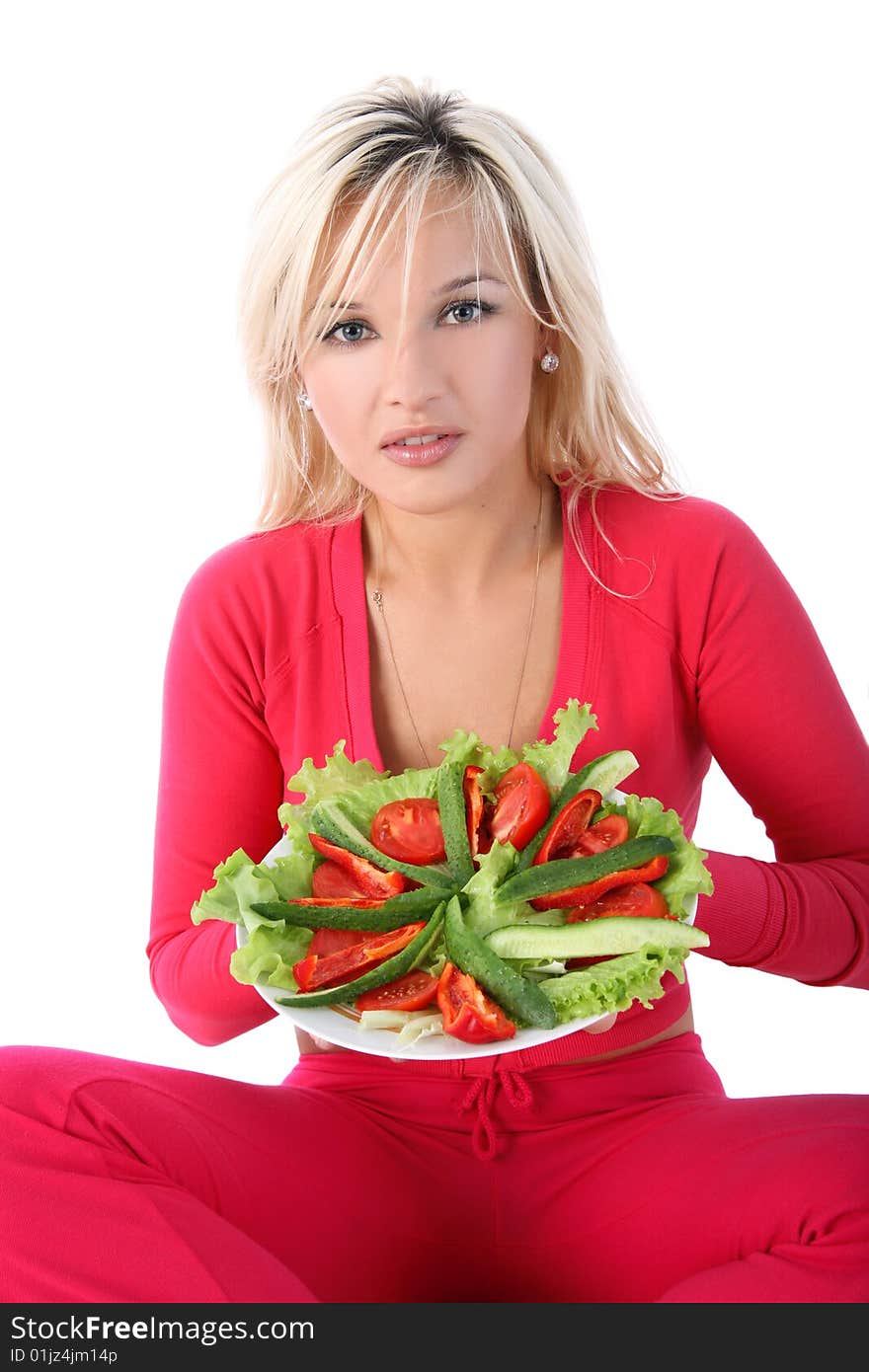 Girl with salad isolated on white