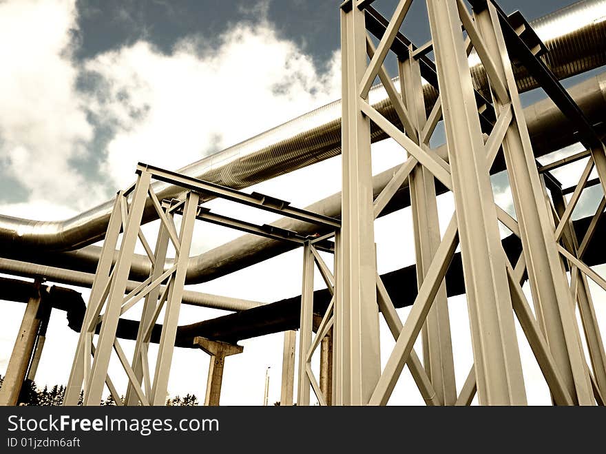 Steel Pipe-line Is Photographed On Sky Background