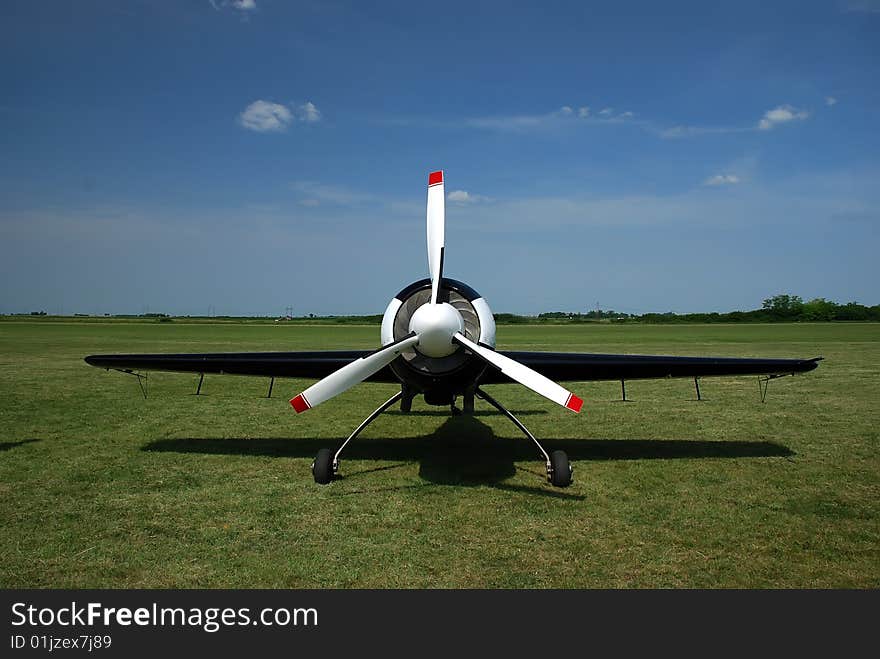 Airplane in the green field