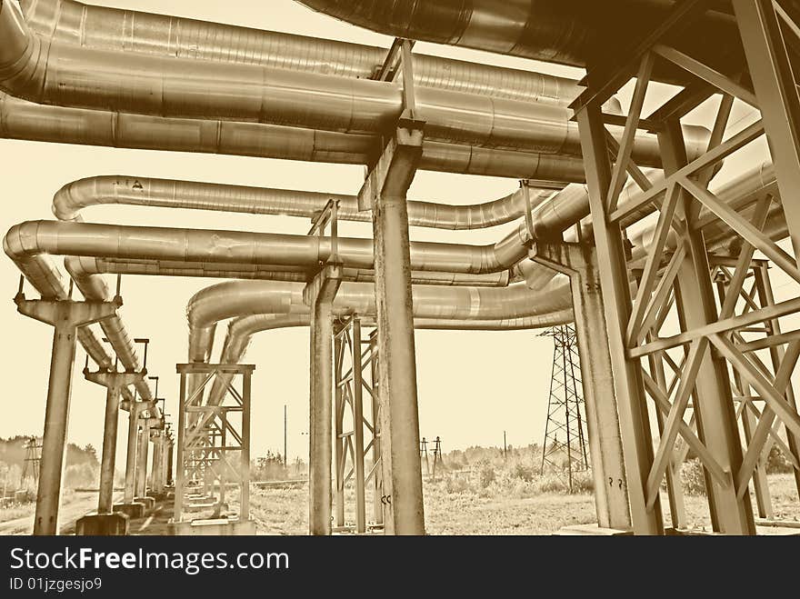 Metallic pipeline over blue sky. Metallic pipeline over blue sky