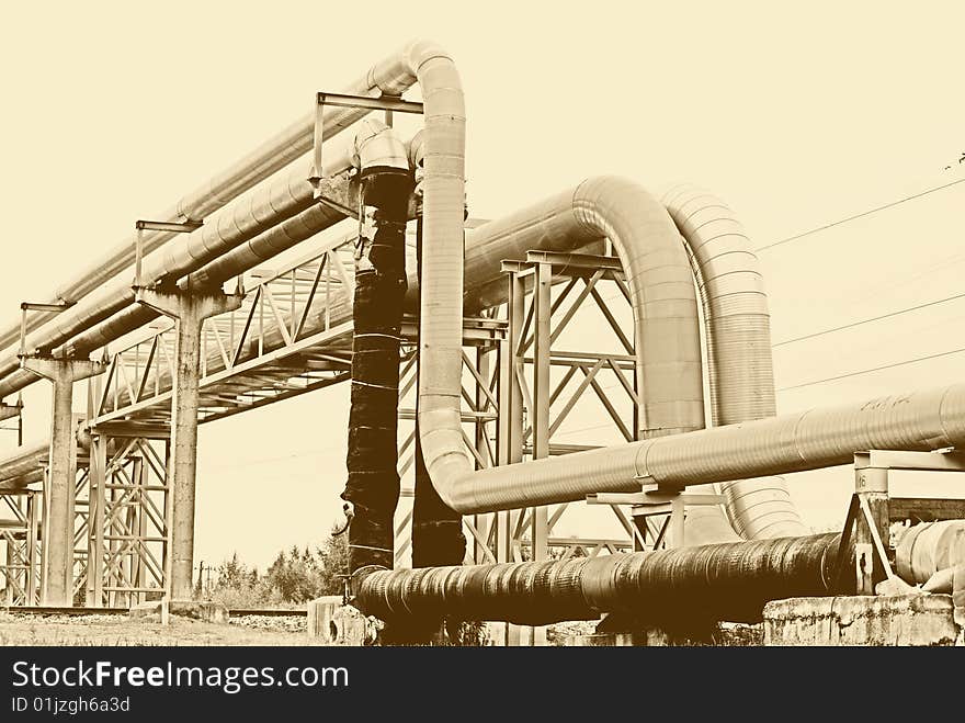 Metallic pipeline over blue sky. Metallic pipeline over blue sky