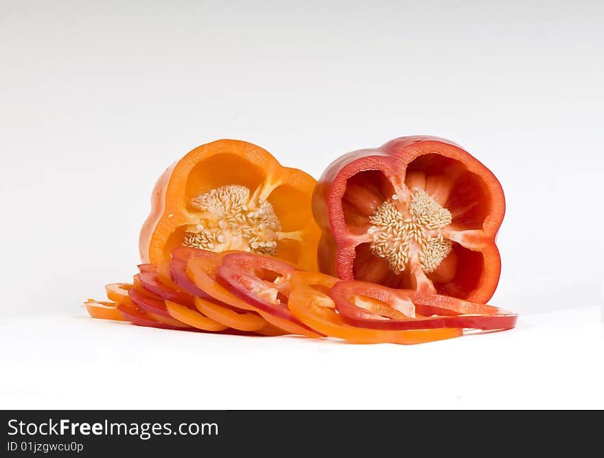 Cut orange and red sweet peppers