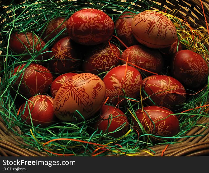 Red easter eggs in the basket