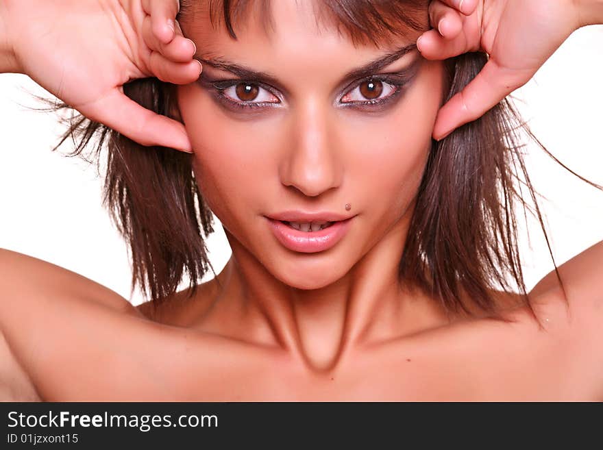 Portrait of the beautiful woman with a birthmark over a lip, isolated on a white background, please see other photos of this series. Portrait of the beautiful woman with a birthmark over a lip, isolated on a white background, please see other photos of this series