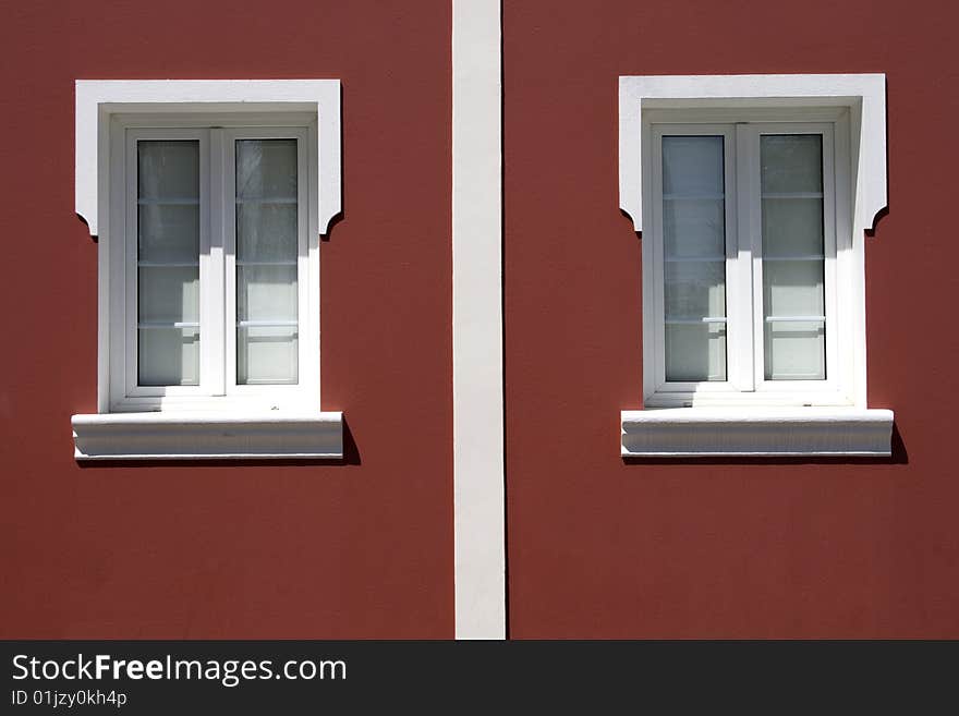 Portuguese windows and  red wall