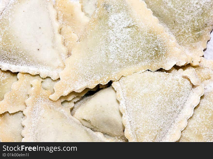 Close up shot of stuffed ravioli pasta