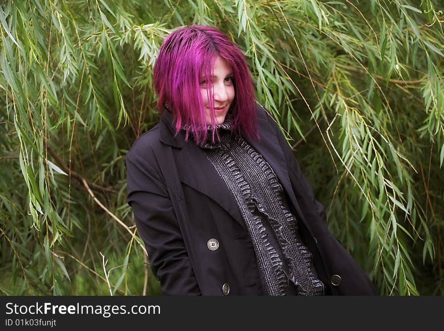 Young beautiful woman in park