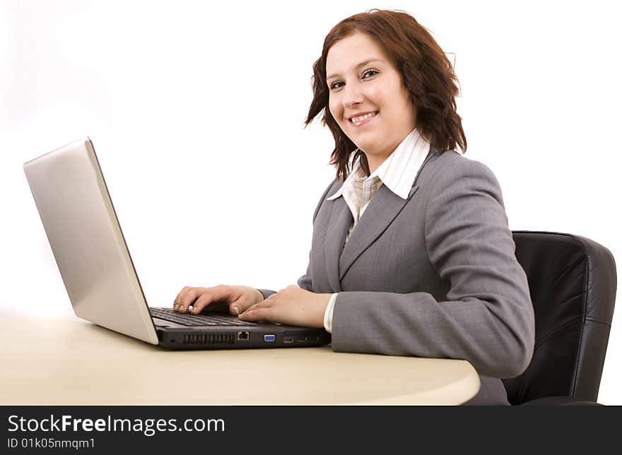 Woman with laptop on a white background