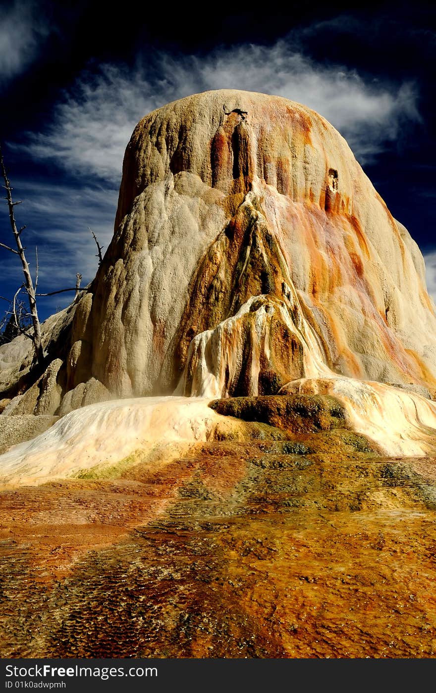 Colorful mound, background blue sky with white cloud. Colorful mound, background blue sky with white cloud.