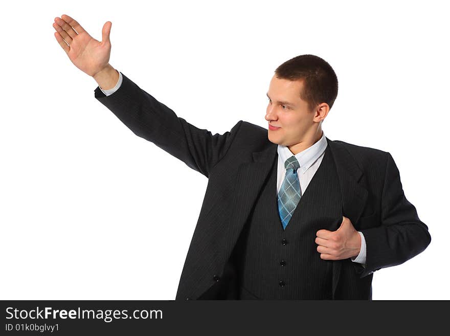 Young businessman with raised hand on white background