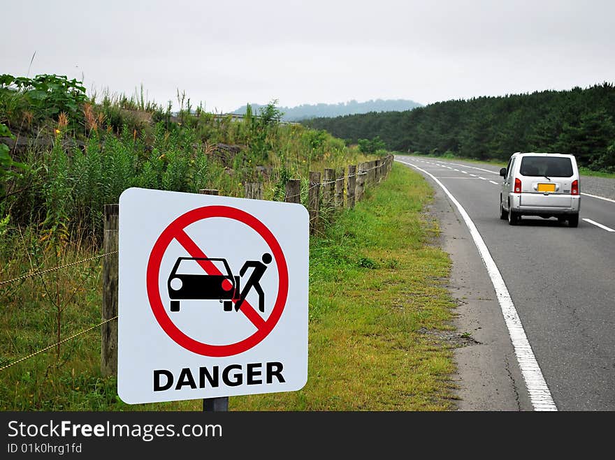 Danger signage at side of road