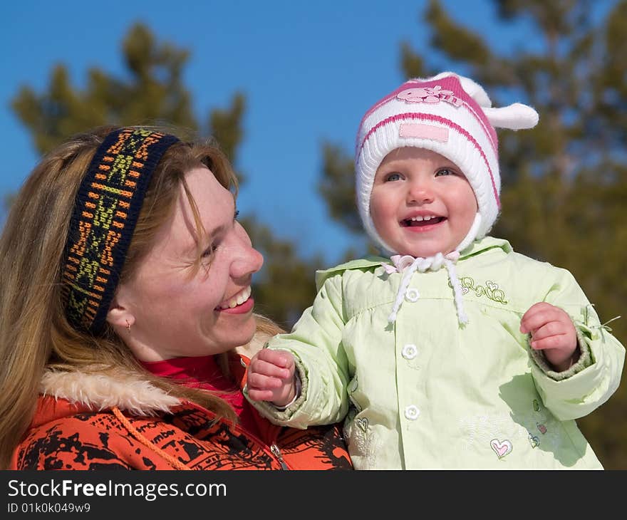 Fun child with mother at springtime