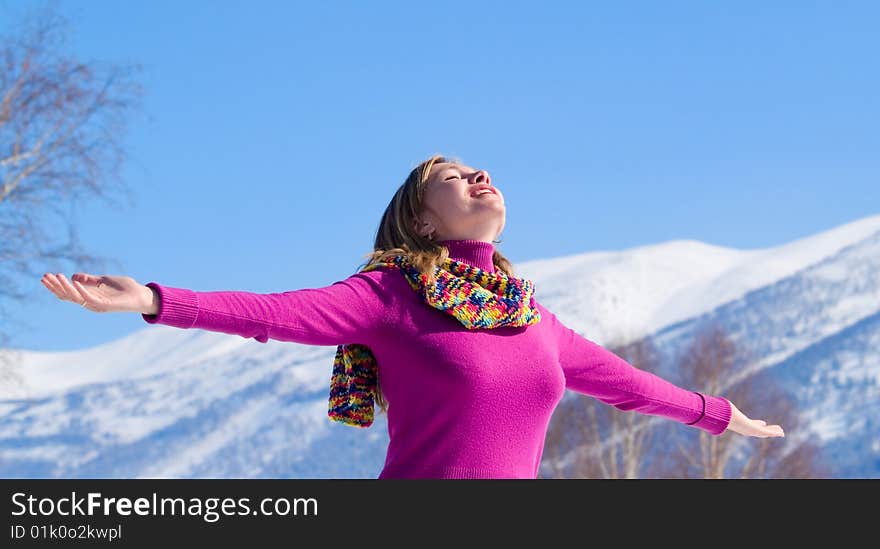 Beauty woman raises hands to sun. Beauty woman raises hands to sun