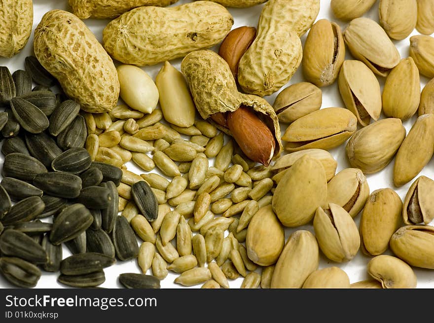 Nuts and seeds on a white background