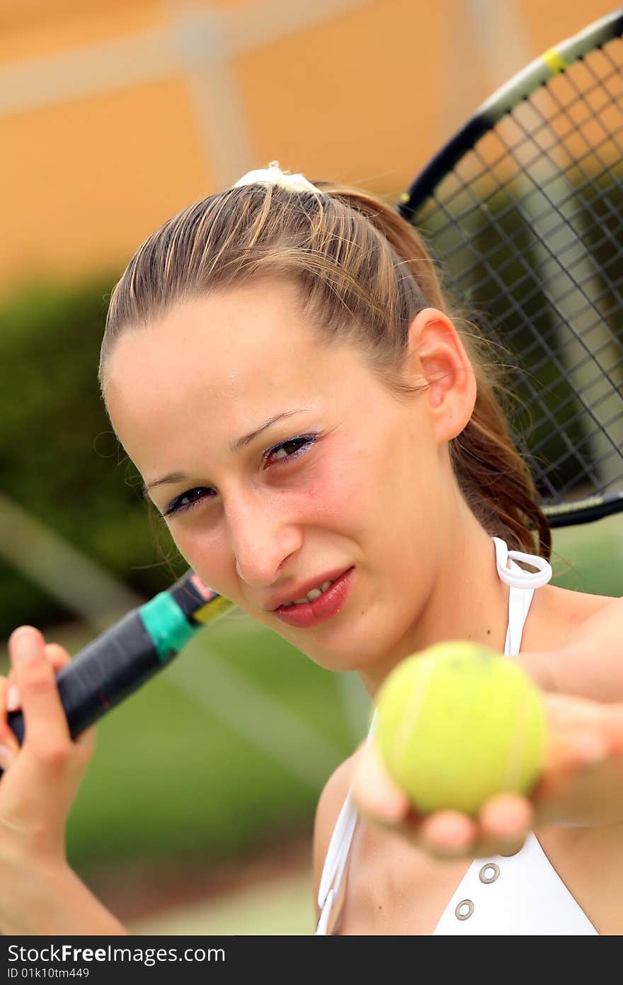 Playing tennis