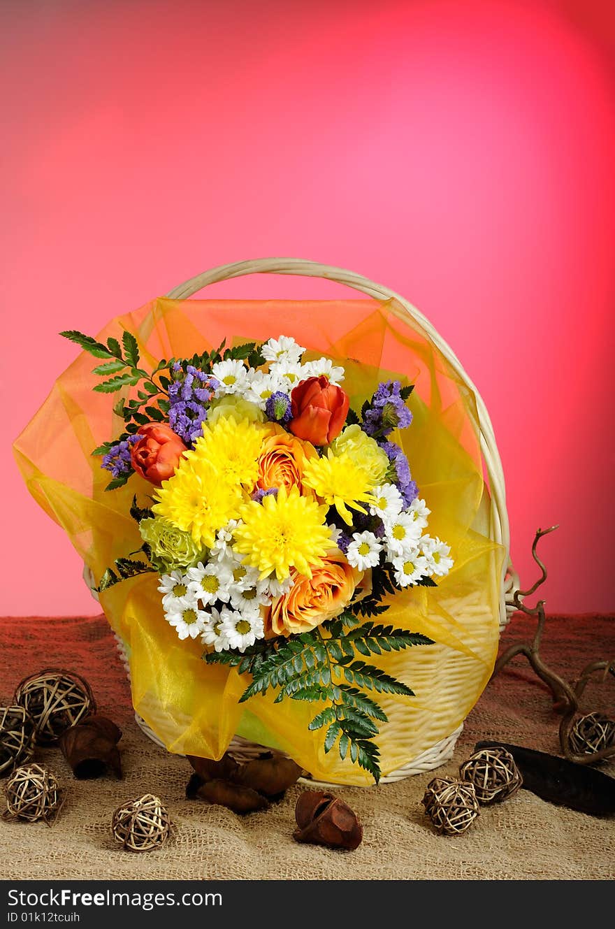 Bunch of flowers in wicker basket