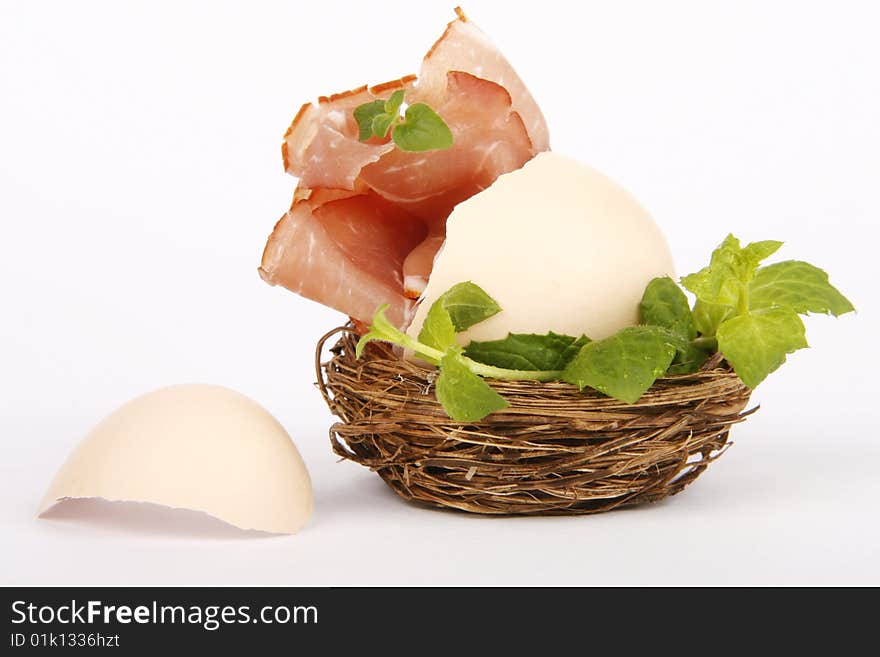 Easter egg with ham and herbs