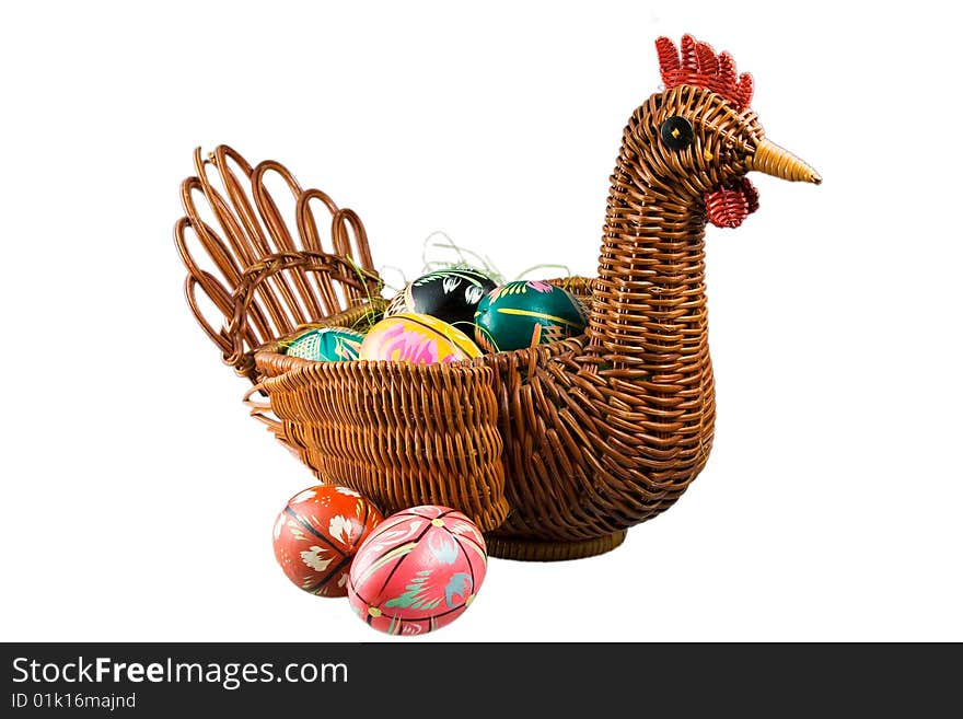 Easter eggs in a basket in the form of a hen