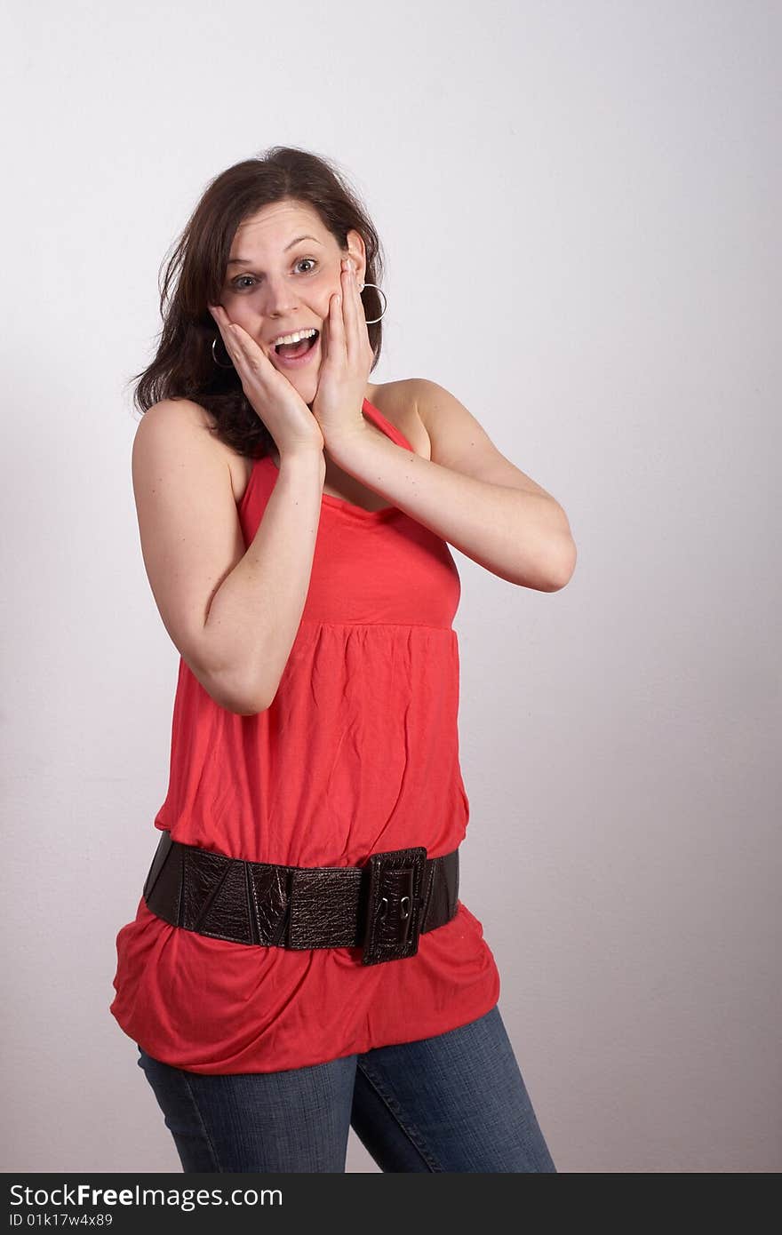 Closeup portrait of a happy young woman very surprised!