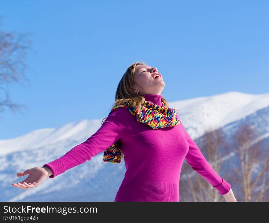 Beauty woman raises hands to sun. Beauty woman raises hands to sun