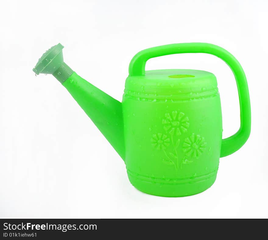 Plastic watering can.