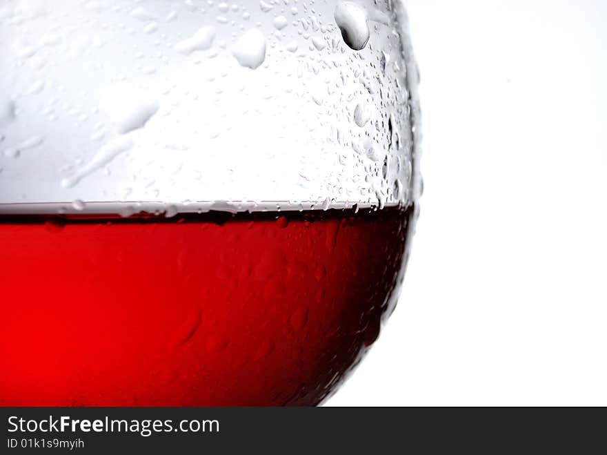 Close-up of glass cup with water drops