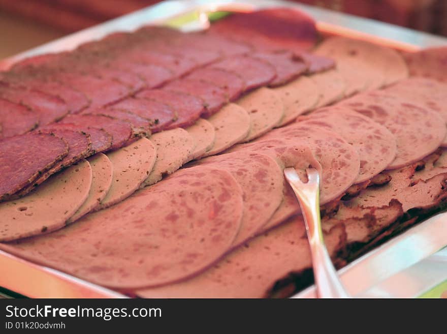 Buffet plate of meat, sliced close up. Buffet plate of meat, sliced close up