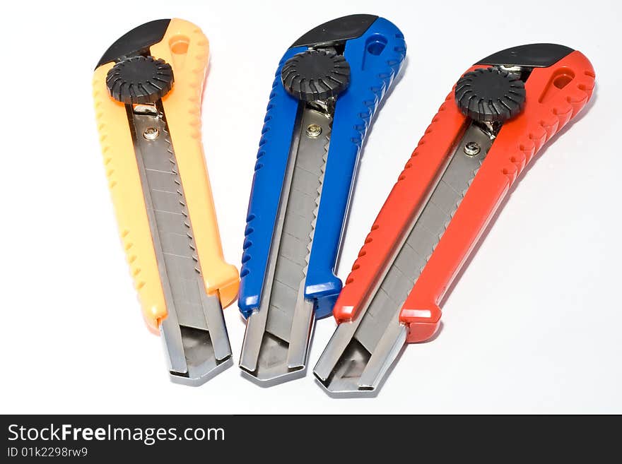 Three paperknifes,red,blue and yellow