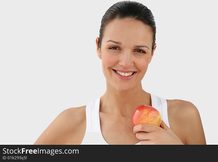 Portrait of a young caucasian woman holding an apple. Portrait of a young caucasian woman holding an apple