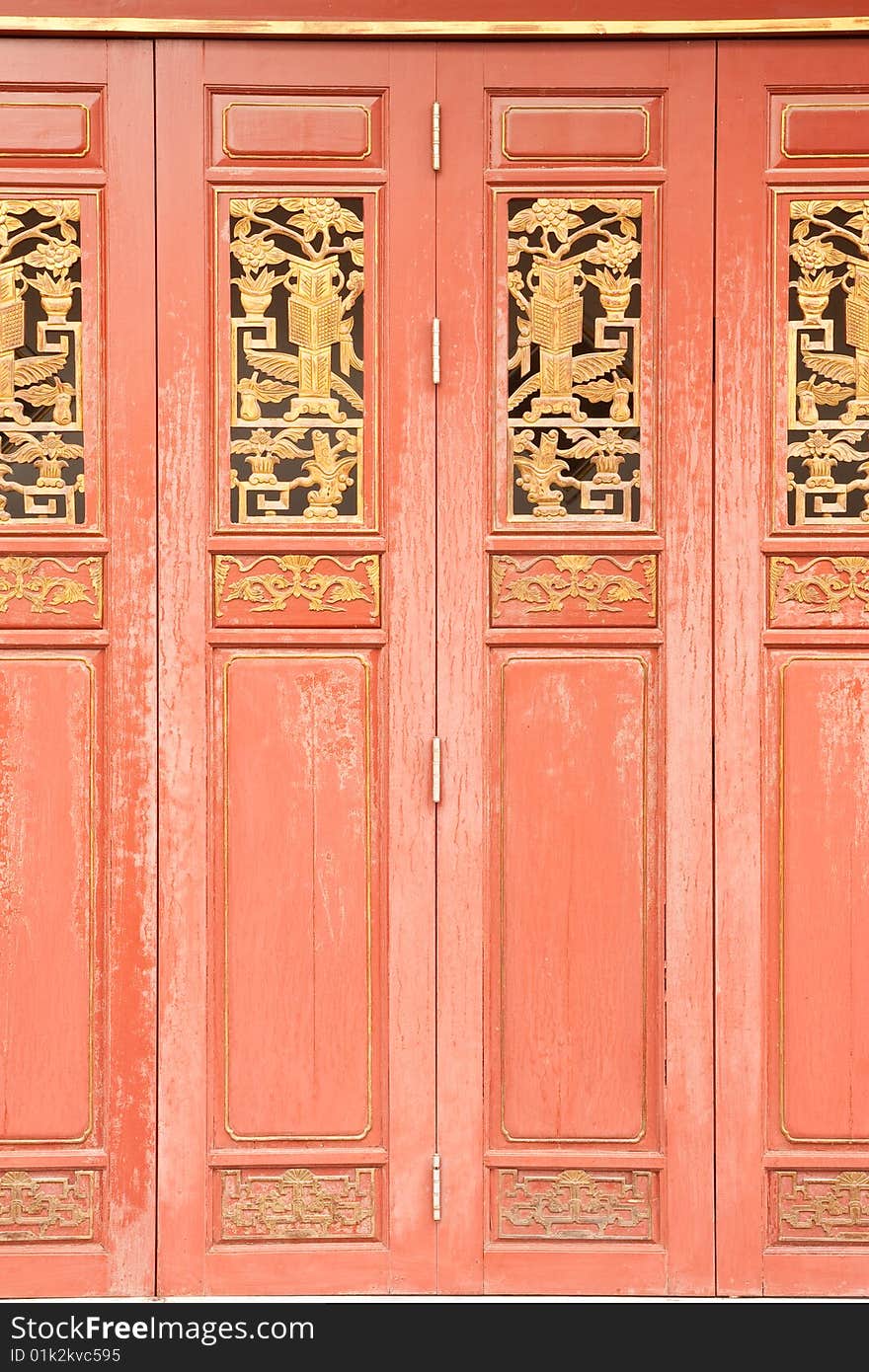 Traditional Chinese style wood door, Wat Rat-orot, Bangkok, Thailand.