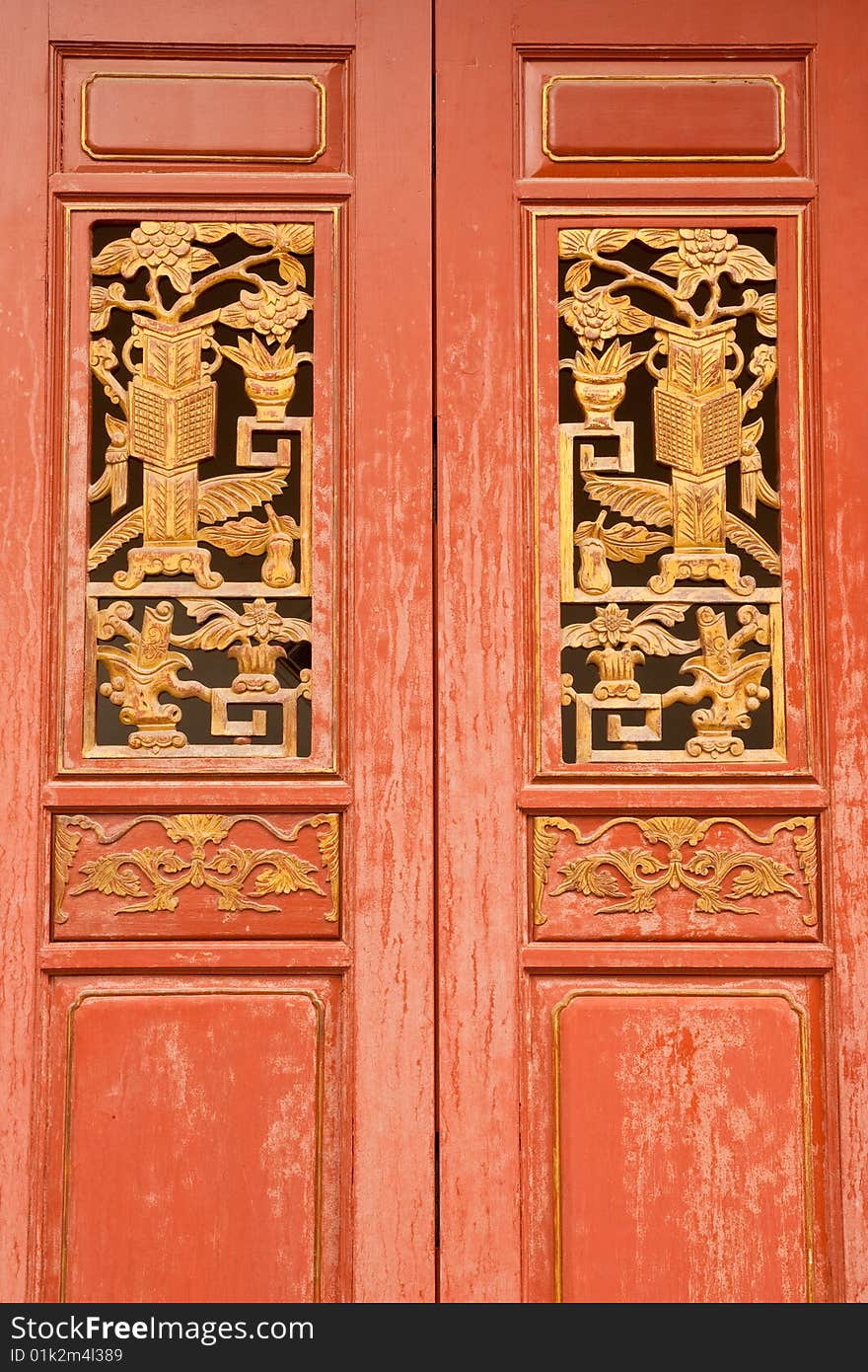 Traditional Chinese style wood door, Wat Rat-orot, Bangkok, Thailand.