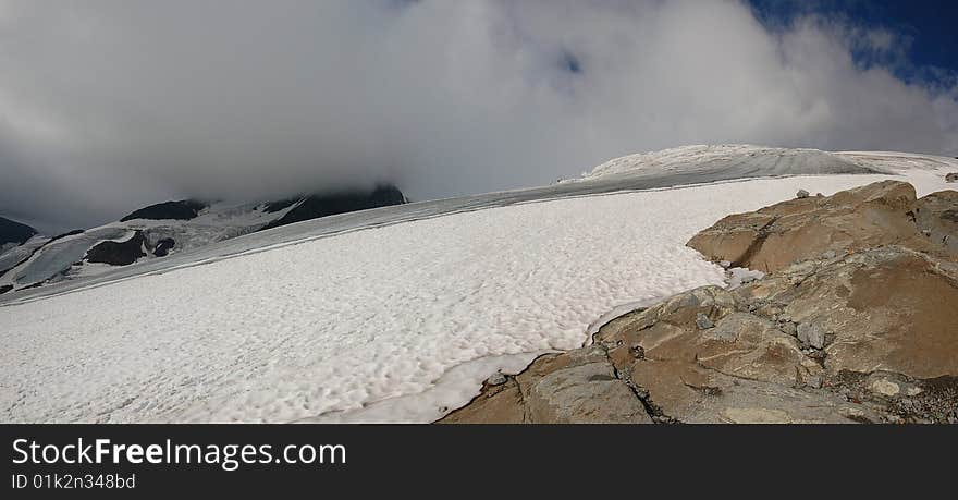 High mountain and glacier with cracks. High mountain and glacier with cracks