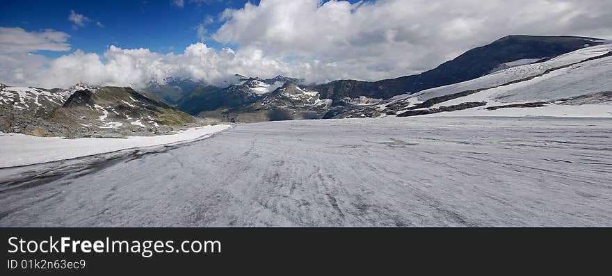 High mountain and glacier with cracks. High mountain and glacier with cracks