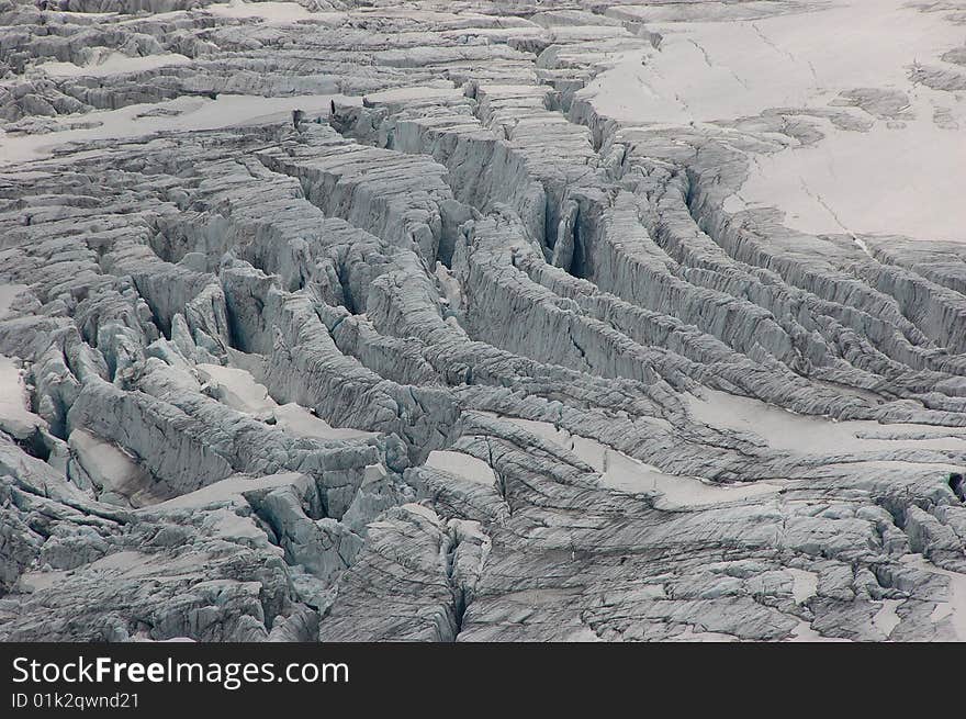 High mountain and glacier with cracks. High mountain and glacier with cracks