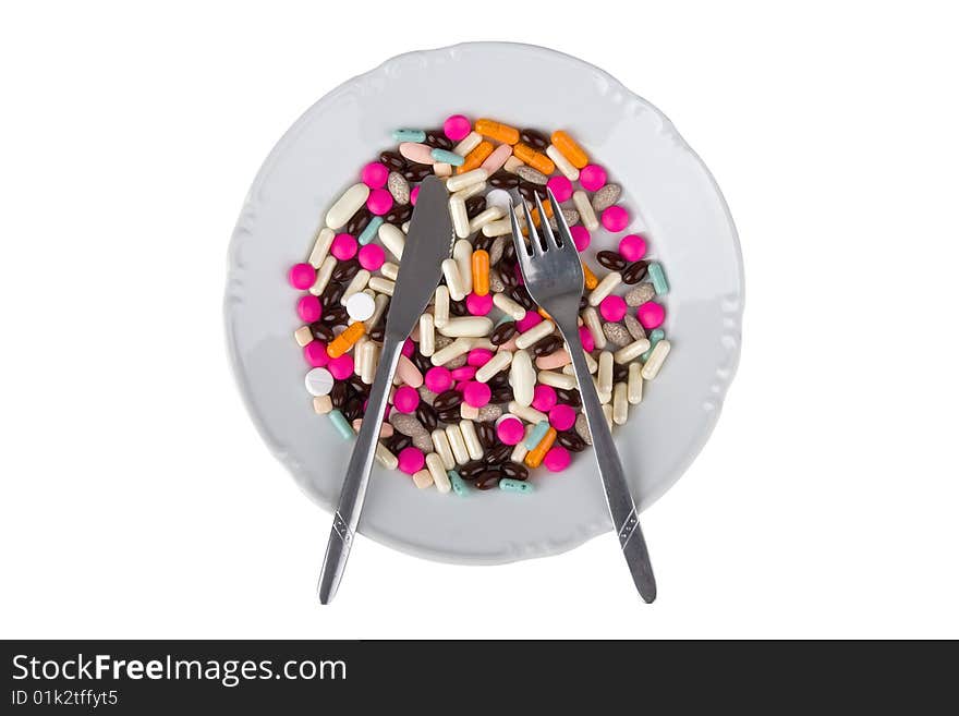 Pharmaceuticals on plate ready to food/illustrative presume medicine/against egg white background.