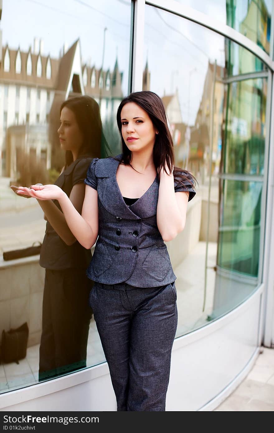 Beautiful young businesswoman holds her hand, blindly. Beautiful young businesswoman holds her hand, blindly